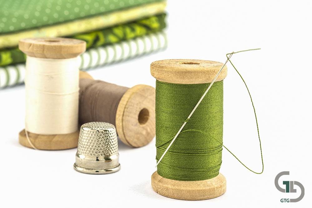wooden spool thread embroidery set with cloth white background min