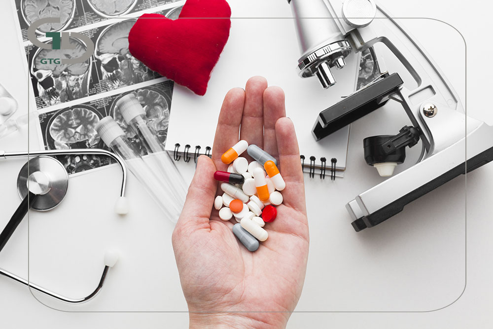 black white medical tools hand with pills